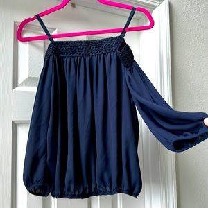 Sheer navy blue blouse with off the shoulder sleeves and elastic waist.